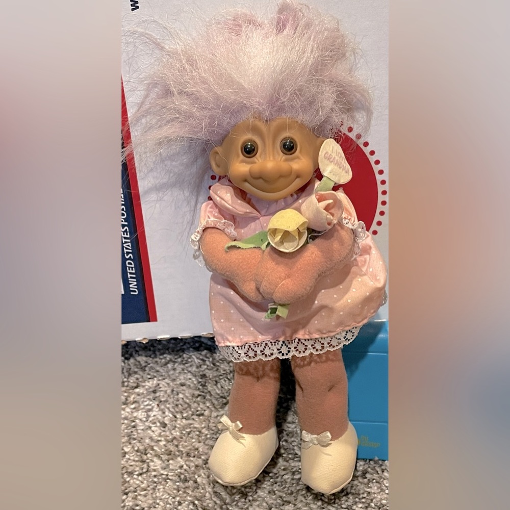 Vintage 90’s Troll Holding an I Love Grandma Sign and Flower Boutique.